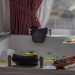 Relaxing indoor bath scene with fruits and petals, perfect for spa or luxury home vibes.